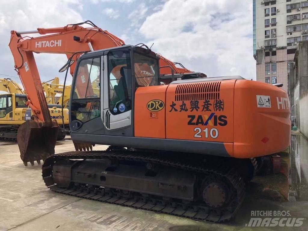 Hitachi zx210 Гусеничні екскаватори