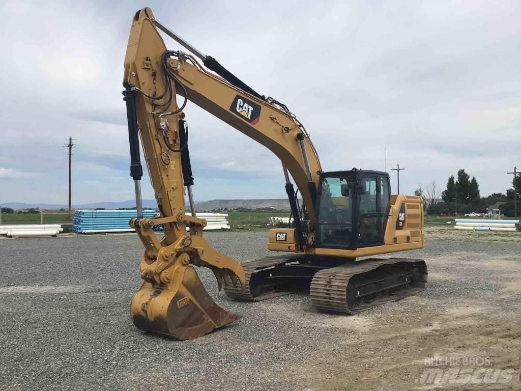 CAT 323 Гусеничні екскаватори