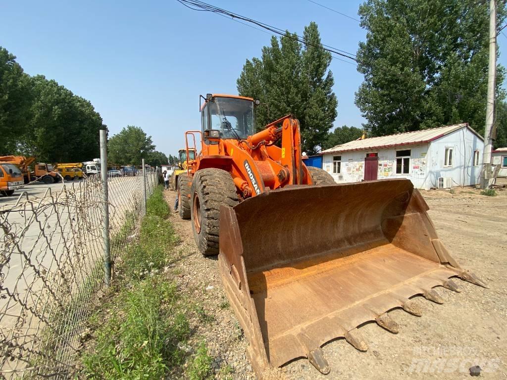Doosan DL503 Екскаватори-навантажувачі