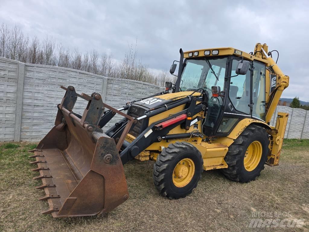 CAT 428 D Екскаватори-навантажувачі