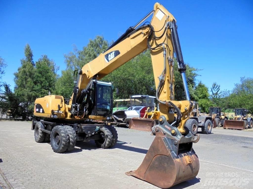 CAT M 322 D Колісні екскаватори