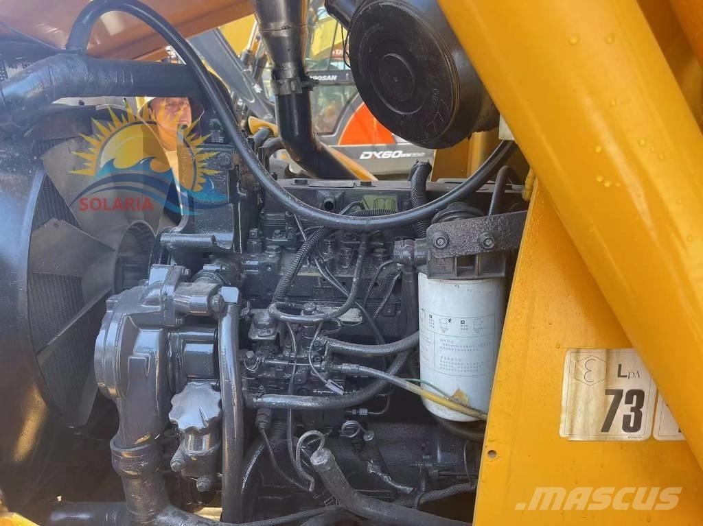 JCB Vibromax 4CX Екскаватори-навантажувачі