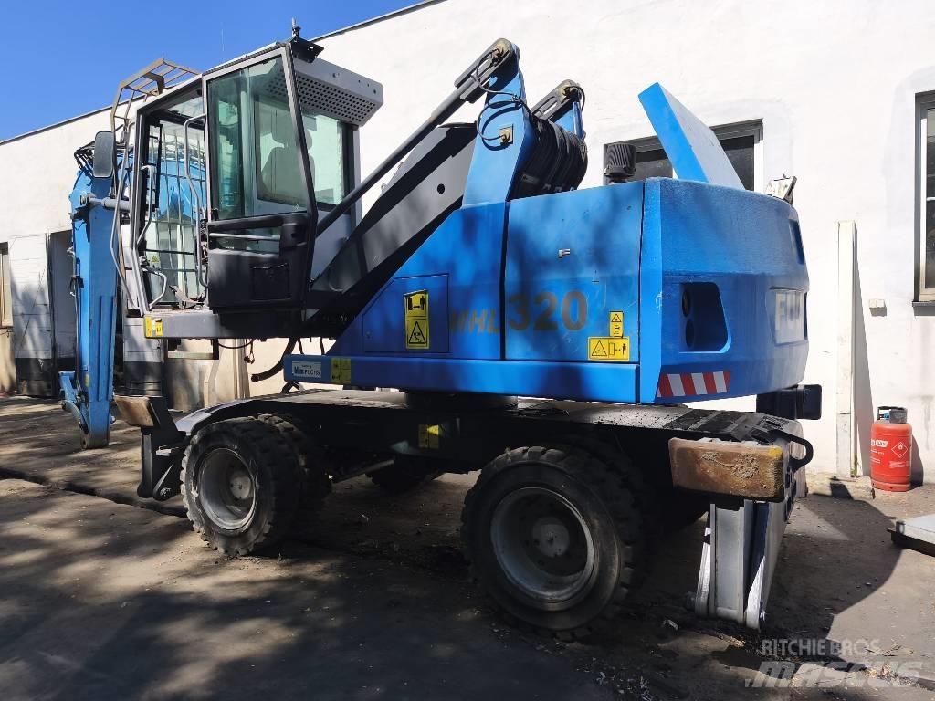 Terex FUCHS 320 Колісні екскаватори