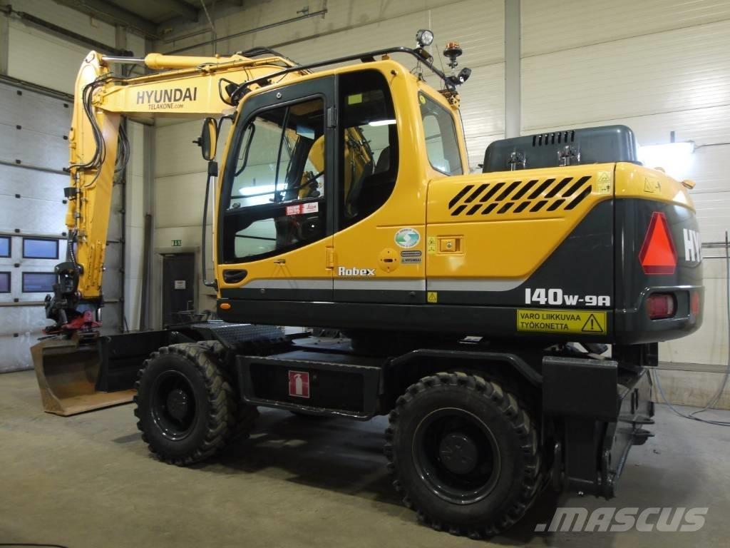 Hyundai R 140 W-9A Колісні екскаватори