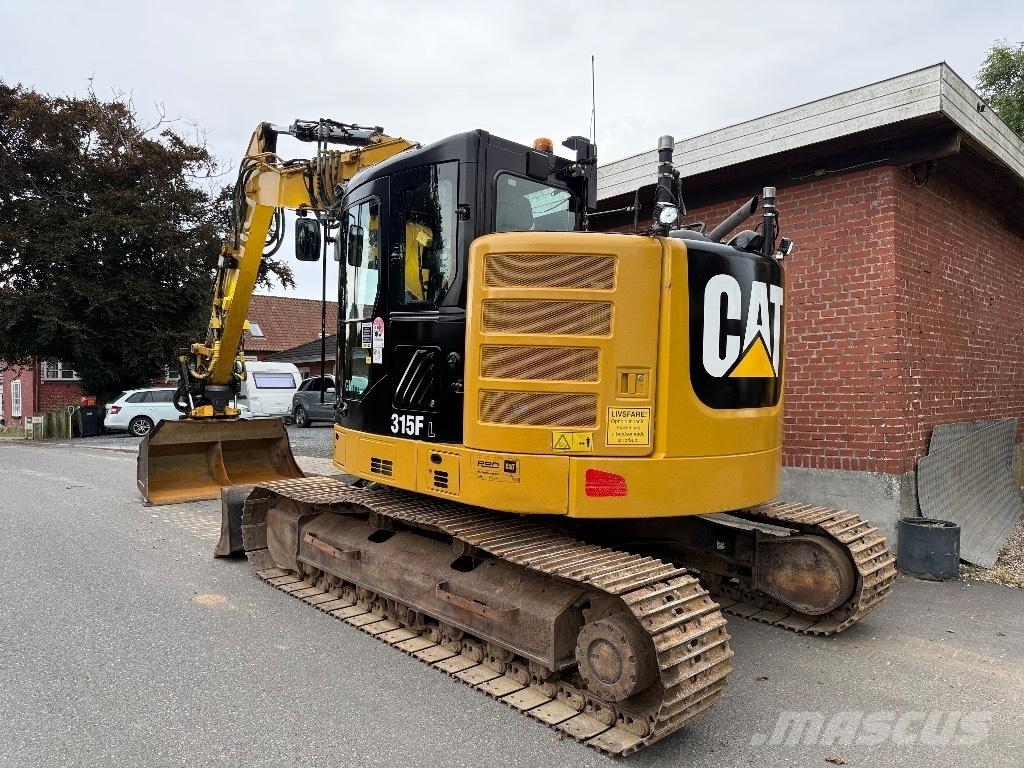 CAT 315 Гусеничні екскаватори