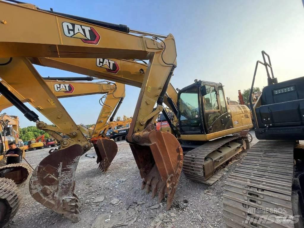 CAT 320 gx Гусеничні екскаватори