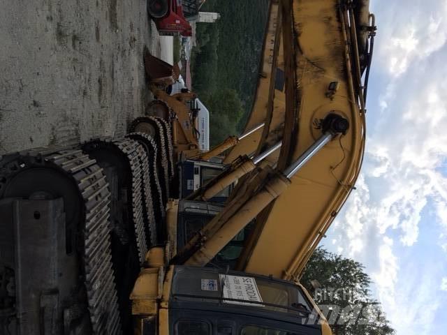 Komatsu 450 Гусеничні екскаватори