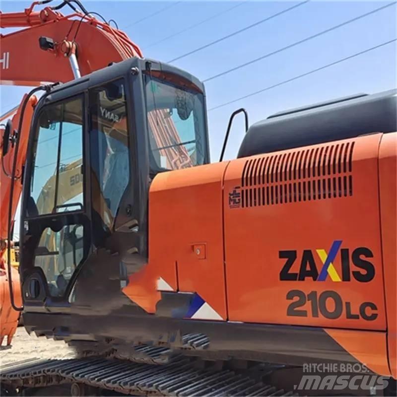 Hitachi ZX 210 Гусеничні екскаватори