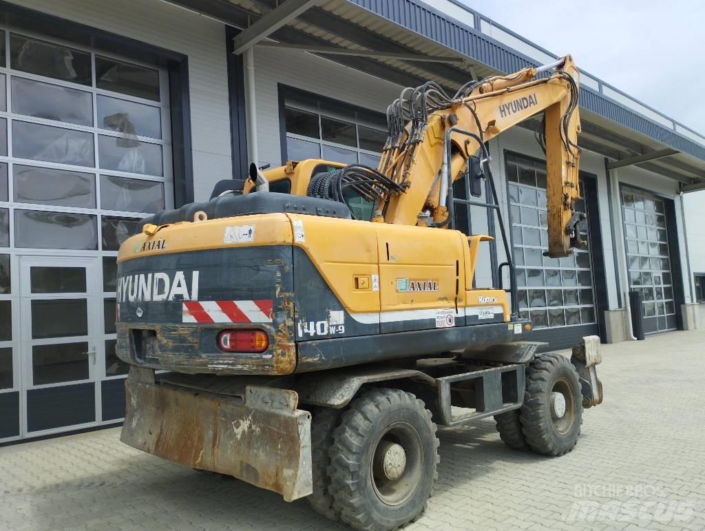 Hyundai 140W Середні екскаватори 7т. - 12т.