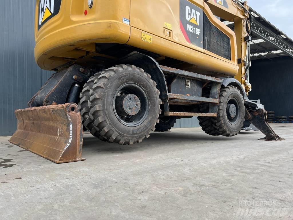 CAT M318F Колісні екскаватори