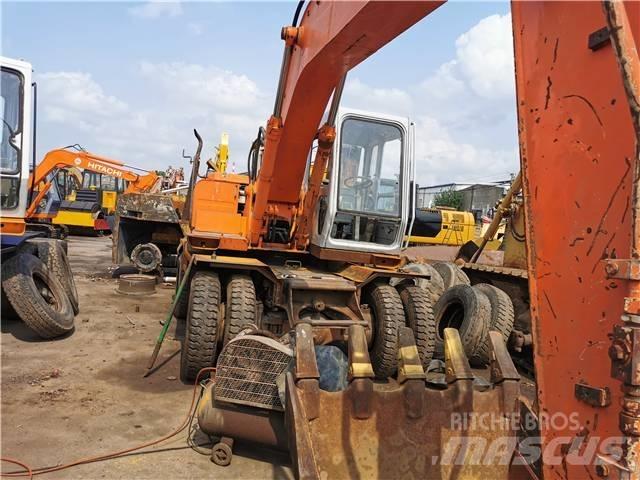 Hitachi EX 160 WD Гусеничні екскаватори