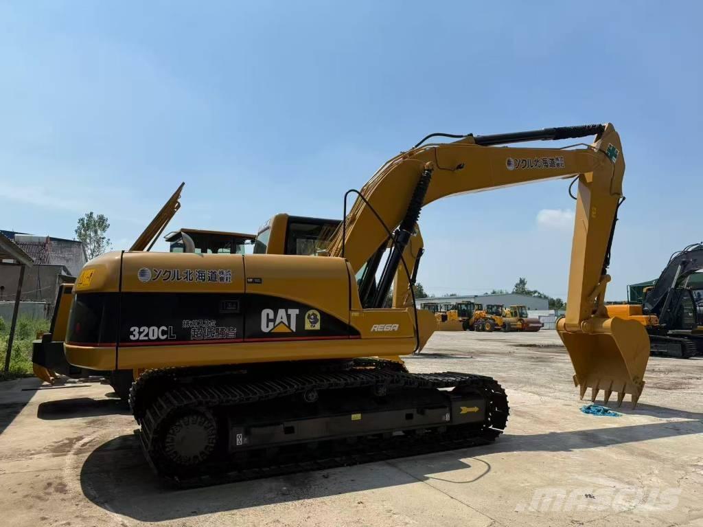 CAT 320 C L Гусеничні екскаватори