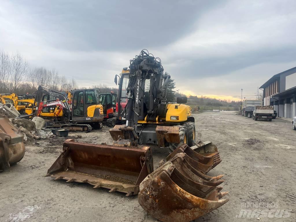 Mecalac 12 M XT Колісні екскаватори