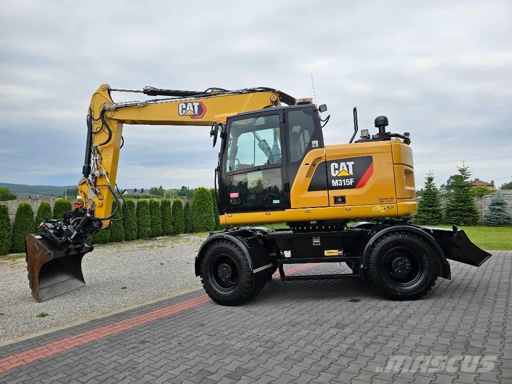 CAT M 315 F Колісні екскаватори