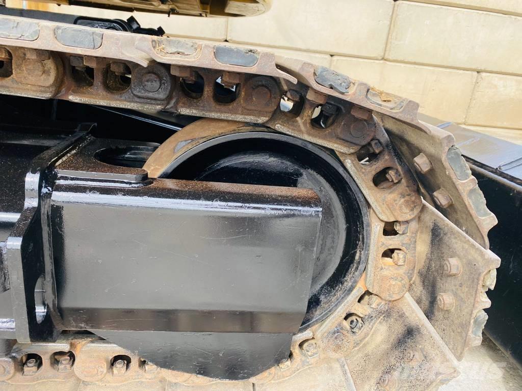 CAT 309 CR Середні екскаватори 7т. - 12т.