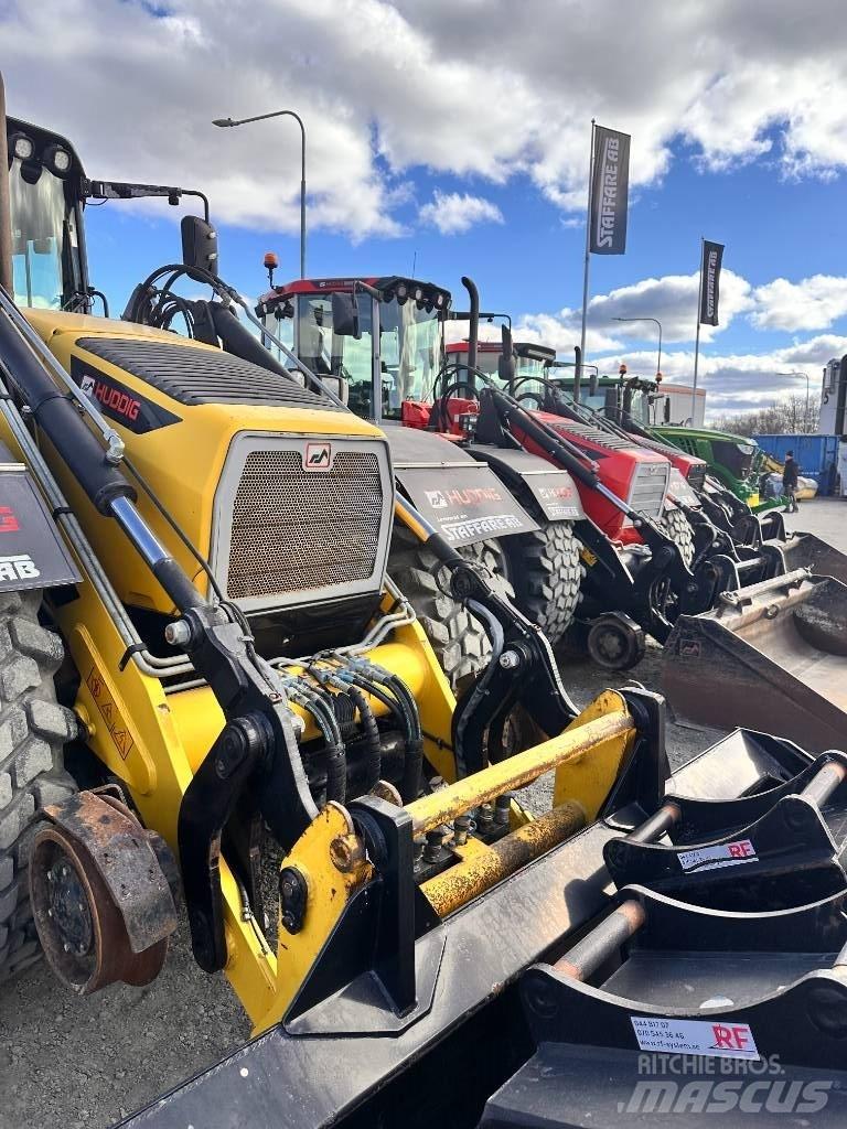 Huddig 1260 C Екскаватори-навантажувачі