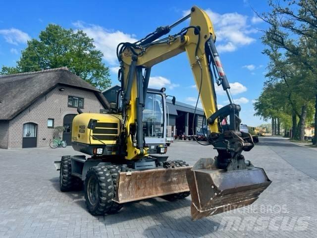 Neuson 9503 Колісні екскаватори