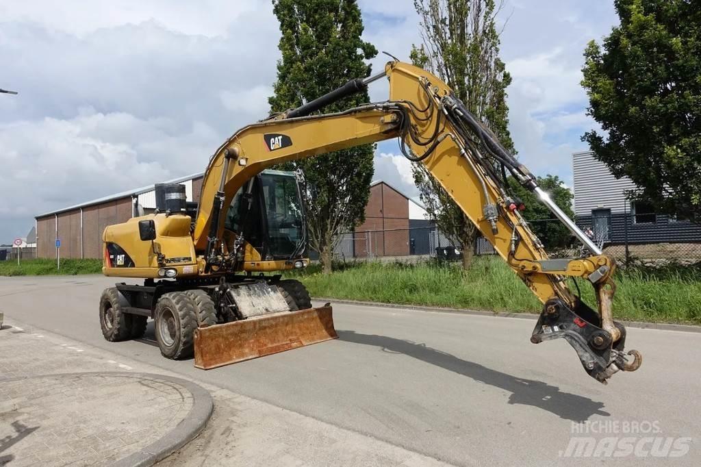 CAT M313 D Колісні екскаватори