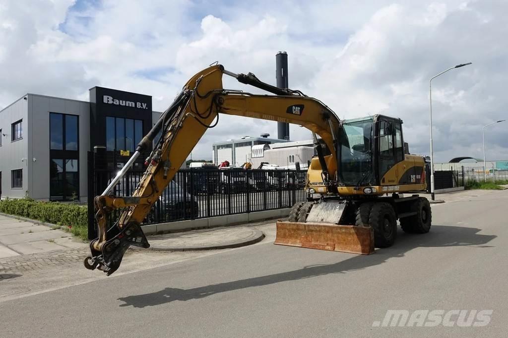 CAT M313 D Колісні екскаватори