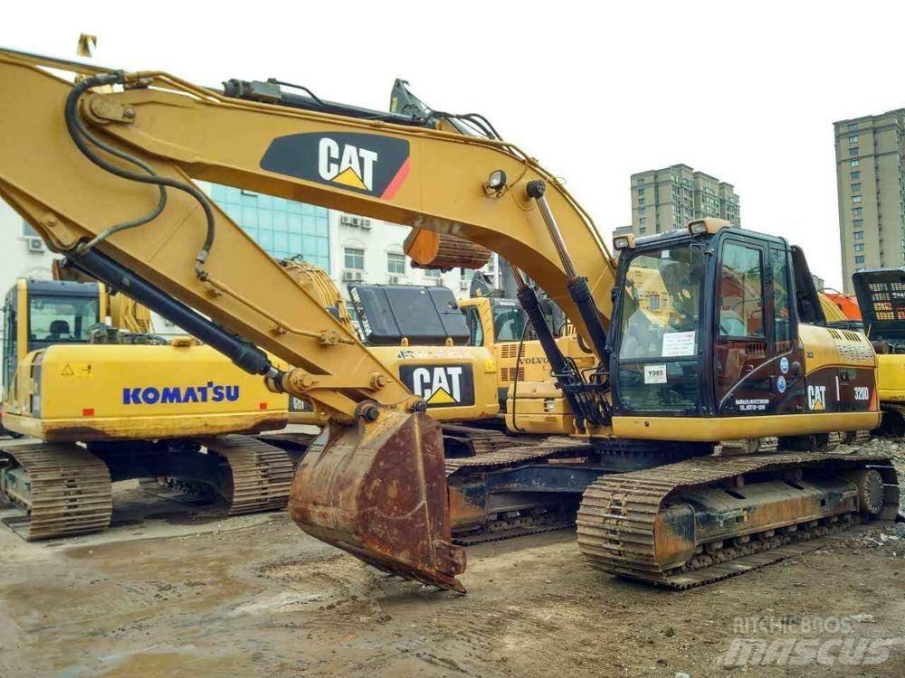 CAT 325 D L Гусеничні екскаватори