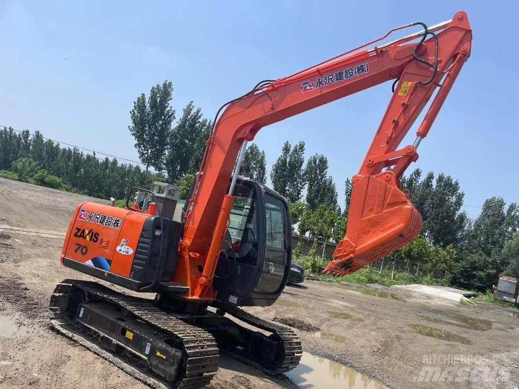 Hitachi ZX70 Гусеничні екскаватори