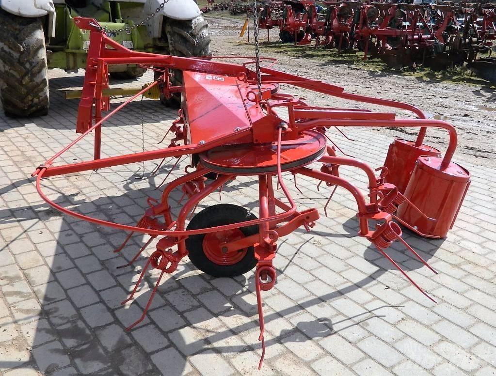 JF 320 Граблі і сінозворушувачі