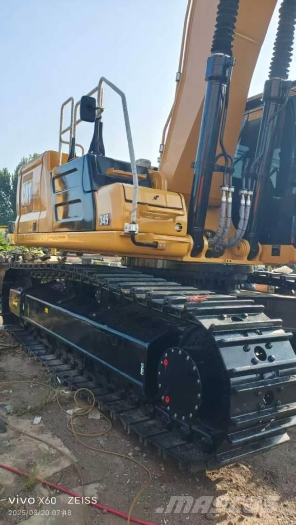 CAT 345 Гусеничні екскаватори