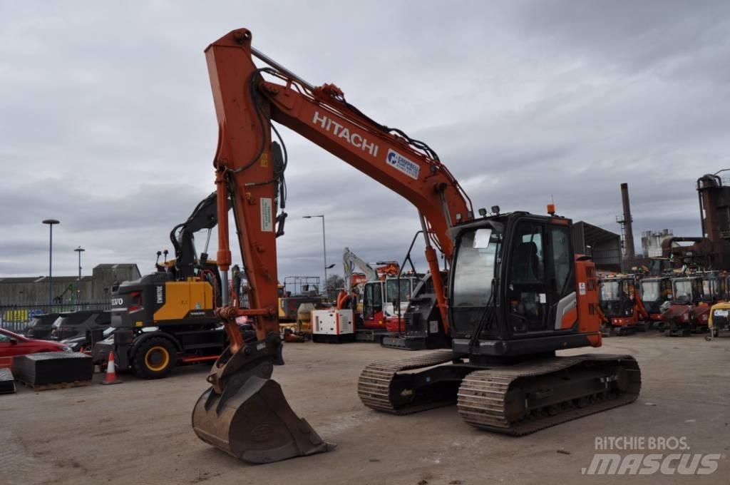 Hitachi ZX 135 US-7 Гусеничні екскаватори
