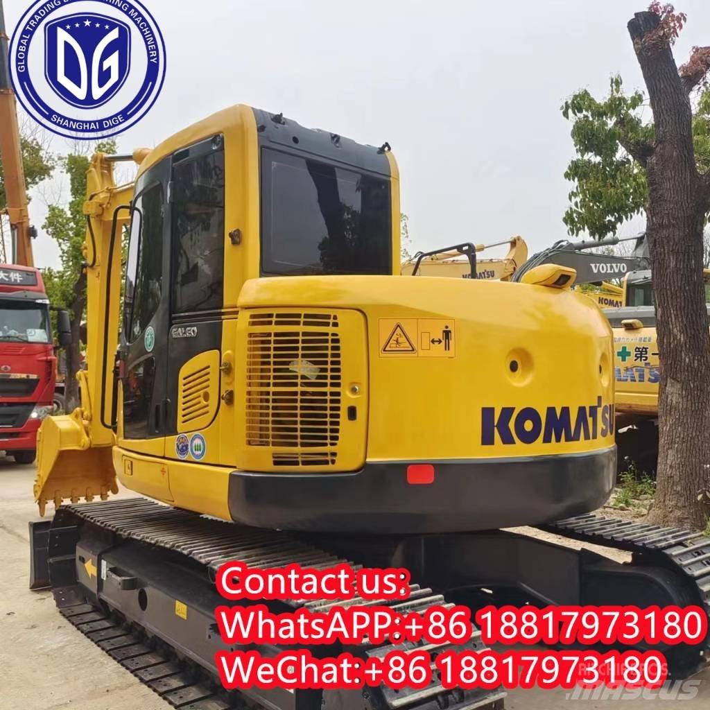 Komatsu PC 128 US Гусеничні екскаватори
