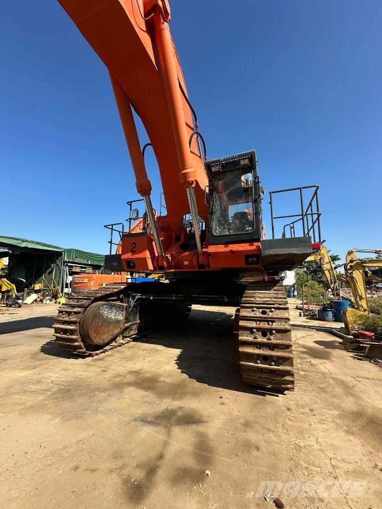 Hitachi EX 1200 Гусеничні екскаватори