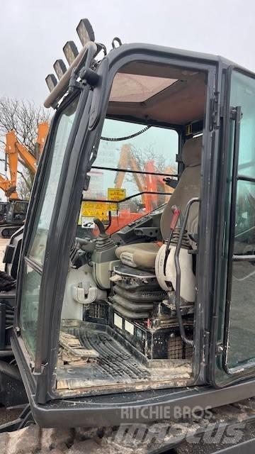 Hitachi ZX 85 Гусеничні екскаватори