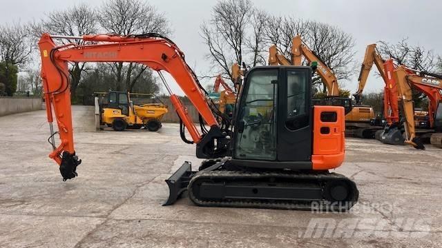 Hitachi ZX 85 Гусеничні екскаватори