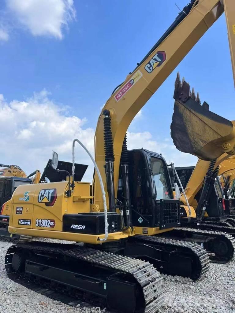 CAT 313 Гусеничні екскаватори