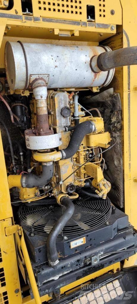 CAT 318BL Гусеничні екскаватори
