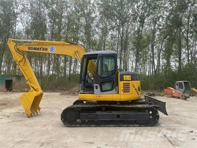 Komatsu PC128US Гусеничні екскаватори