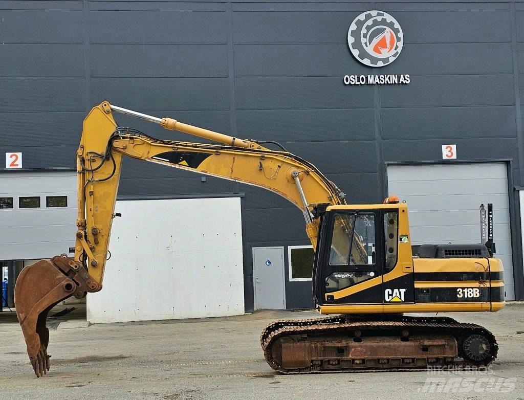 CAT 318 B L Гусеничні екскаватори