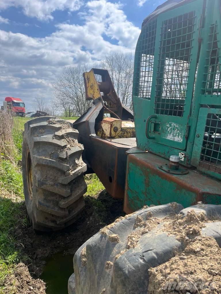 Timberjack 240A Трельовочні трактора