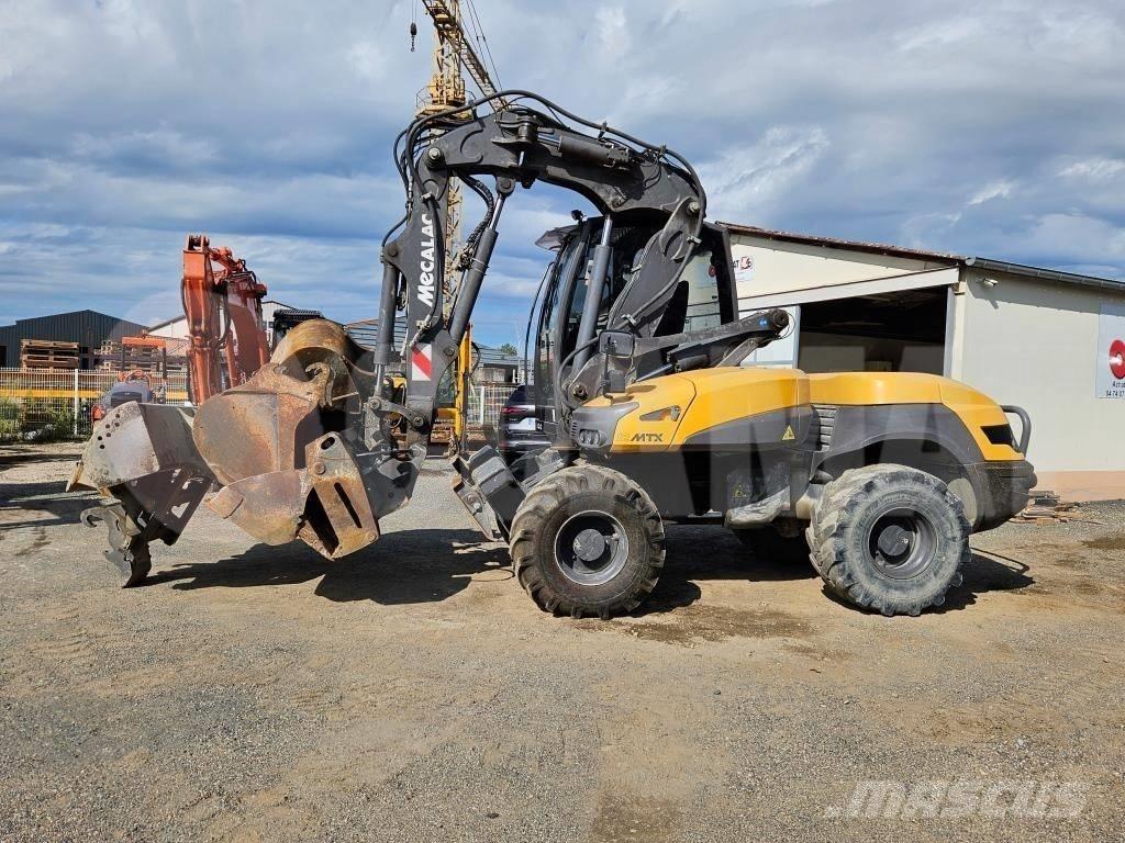 Mecalac 12 MTX Колісні екскаватори