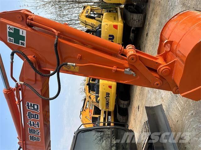 Hitachi ZX70 Гусеничні екскаватори
