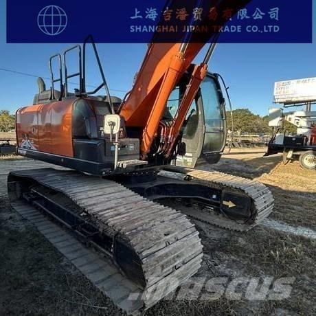 Hitachi ZX 210 Гусеничні екскаватори