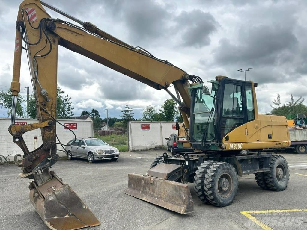 CAT 315 C Колісні екскаватори