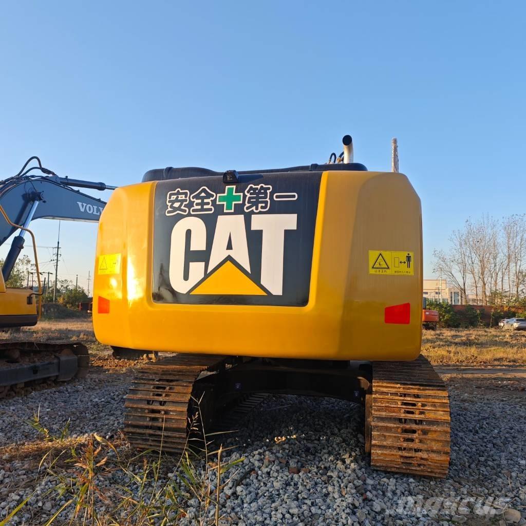 CAT 320 Гусеничні екскаватори