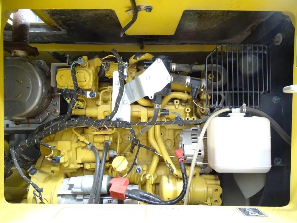 CAT 310 Гусеничні екскаватори