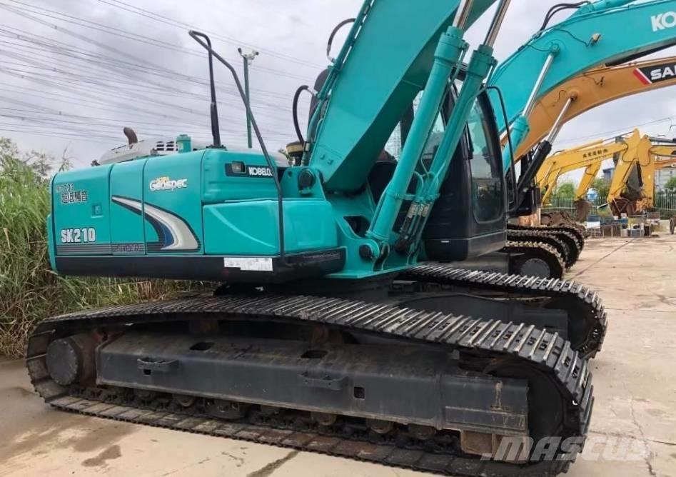 Kobelco SK 210 Гусеничні екскаватори
