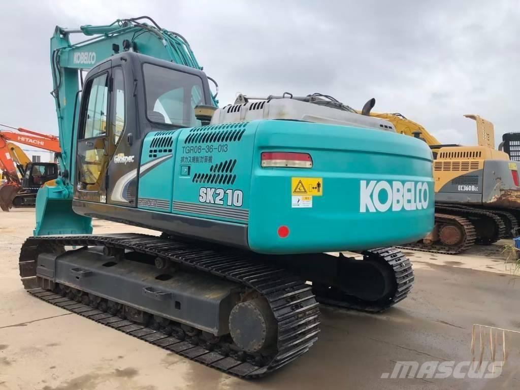 Kobelco SK 210 Гусеничні екскаватори