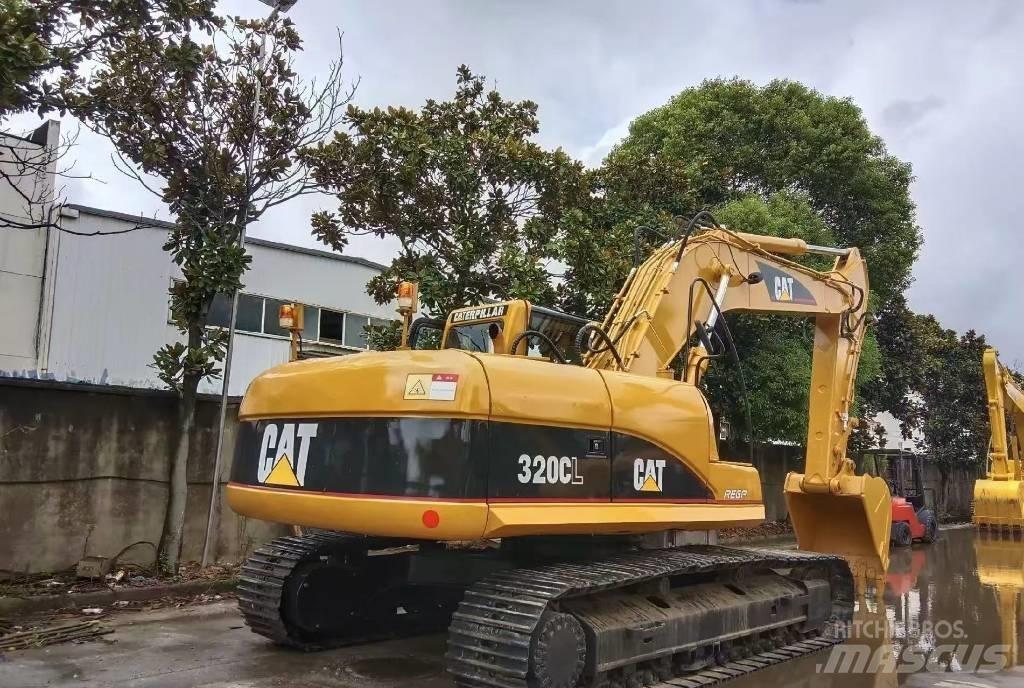 CAT 320 C Гусеничні екскаватори
