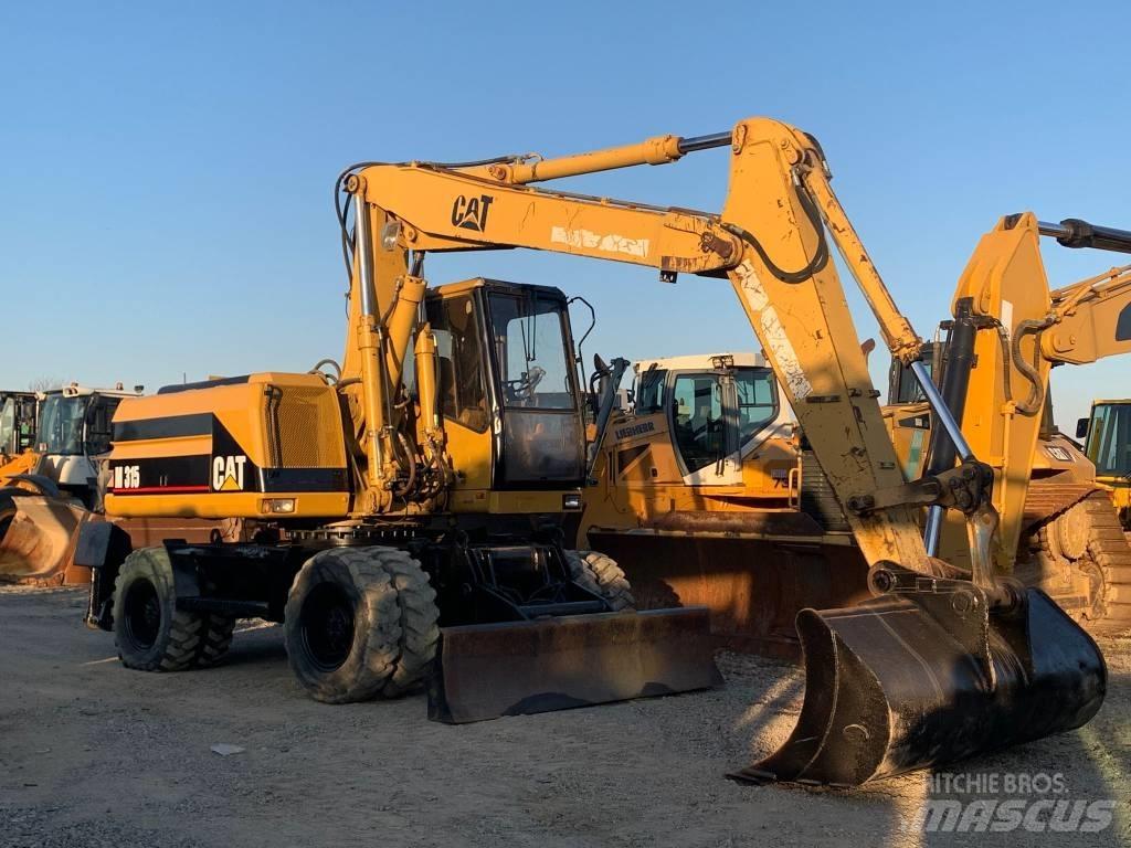 CAT M 315 Колісні екскаватори