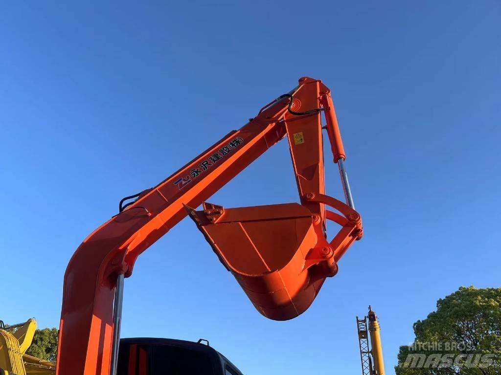 Hitachi ZX70 Гусеничні екскаватори