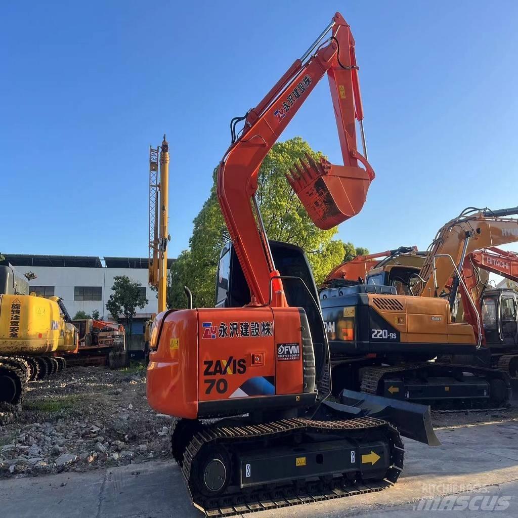 Hitachi ZX70 Гусеничні екскаватори