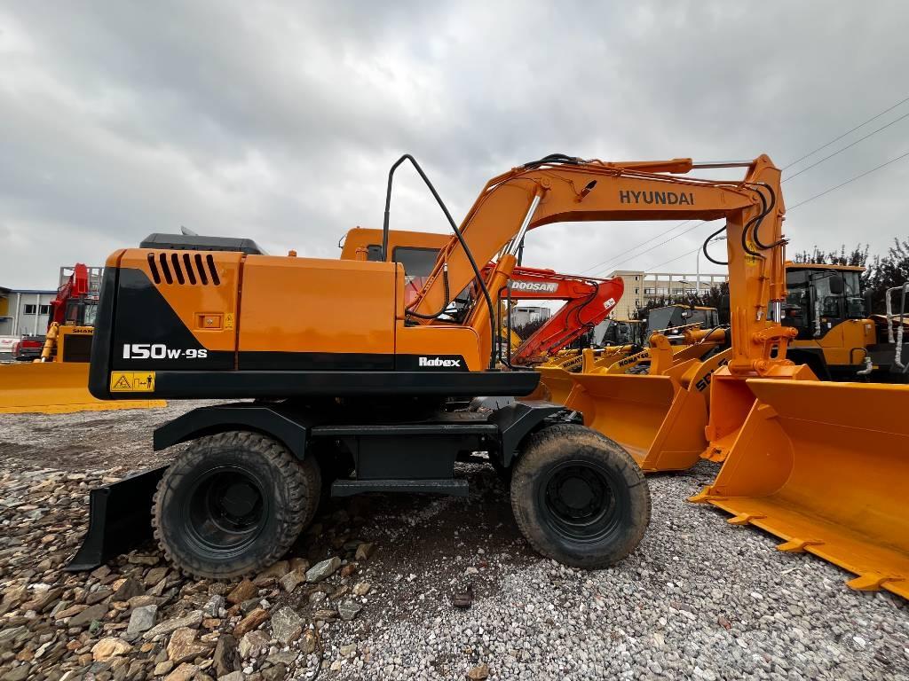 Hyundai 150W-7 Колісні екскаватори